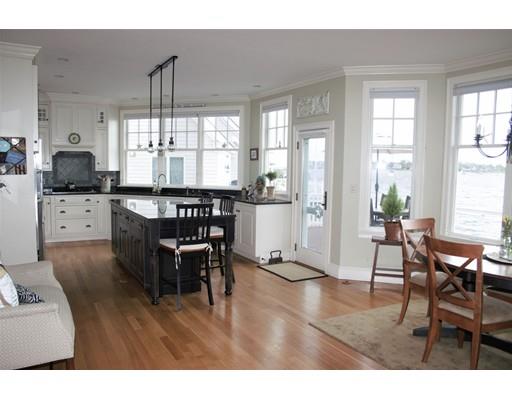 54 Lighthouse Road Scituate, MA 02066 - Photo 8 of 30 a view of a dining room with furniture and wooden floor