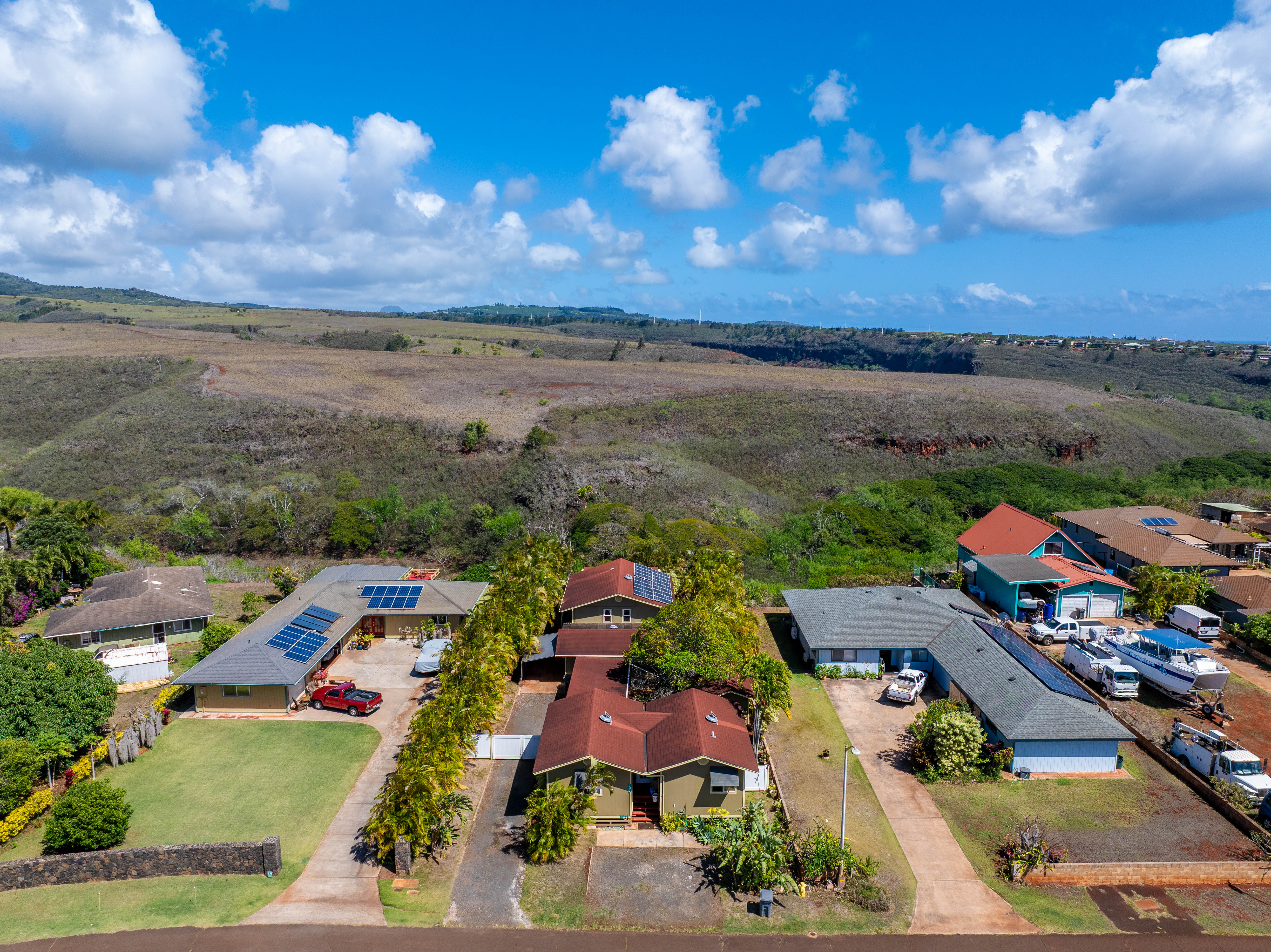 5060 Alii Road Hanapepe, HI 96716 - Photo 2 of 30 an aerial view of residential houses with outdoor space