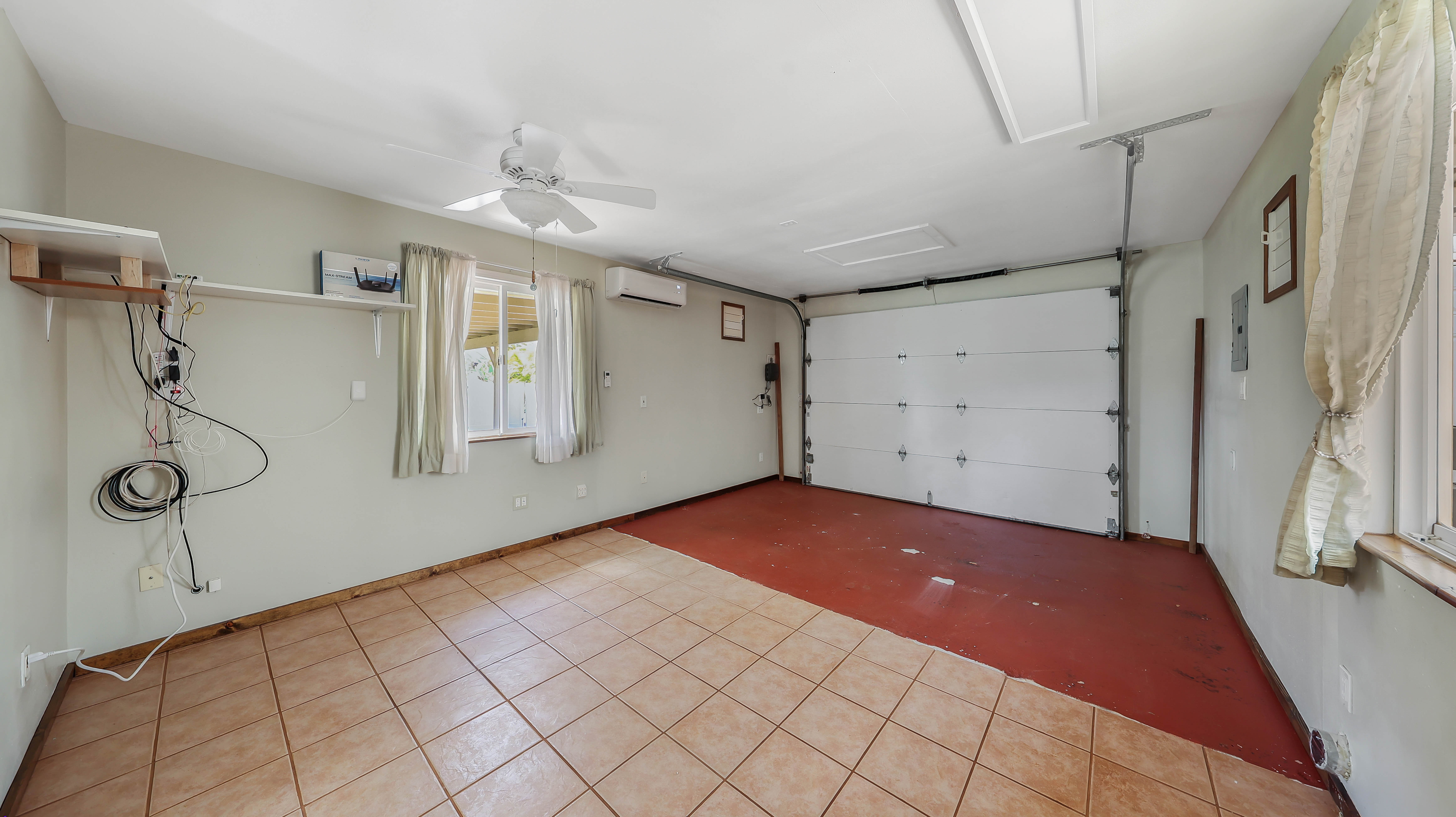 5060 Alii Road Hanapepe, HI 96716 - Photo 21 of 30 a bedroom with a bed and a shower