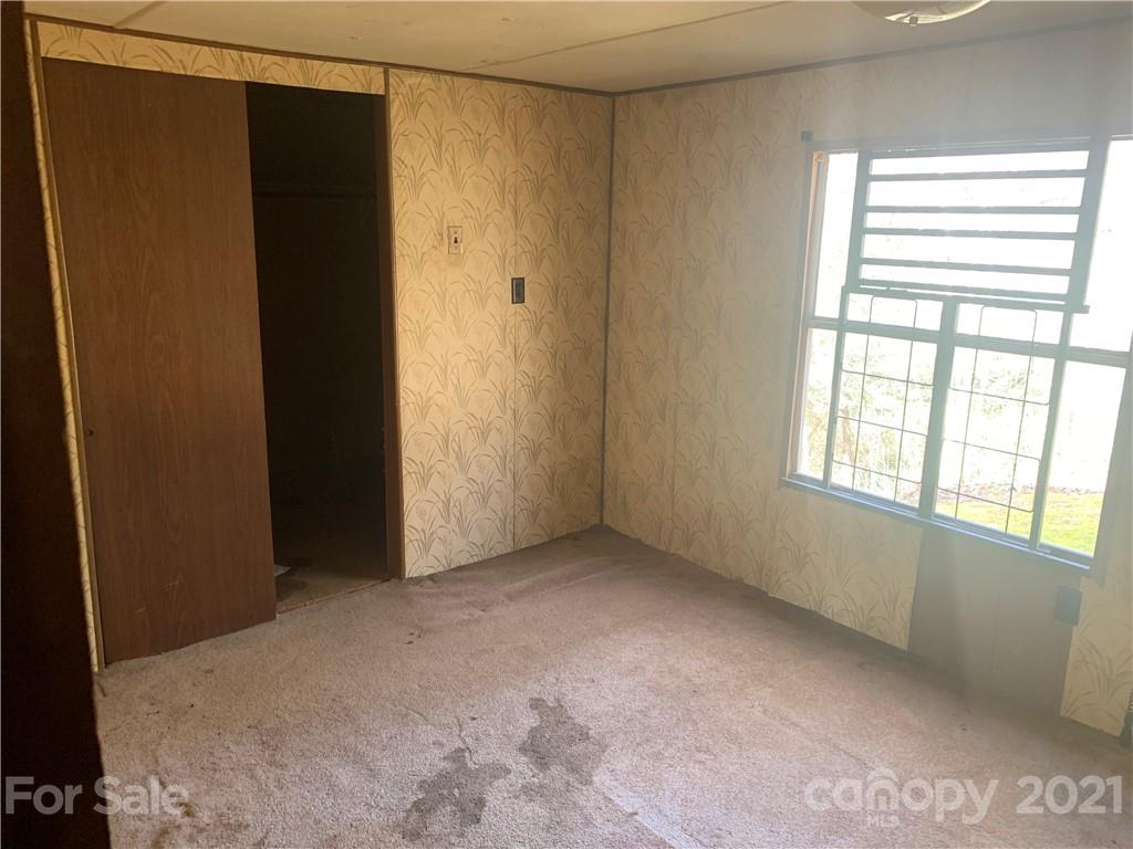 255 Sherrill Road Bryson City, NC 28713 - Photo 11 of 15 a view of an empty room with a window