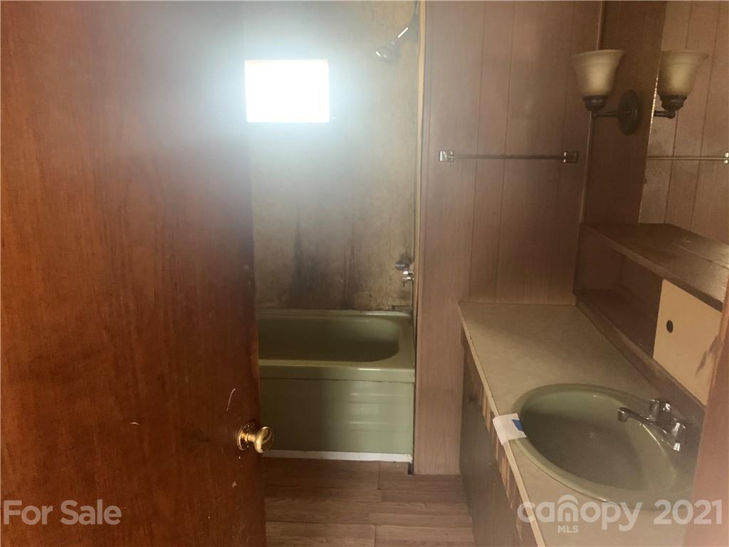 255 Sherrill Road Bryson City, NC 28713 - Photo 14 of 15 a bathroom with a sink and toilet