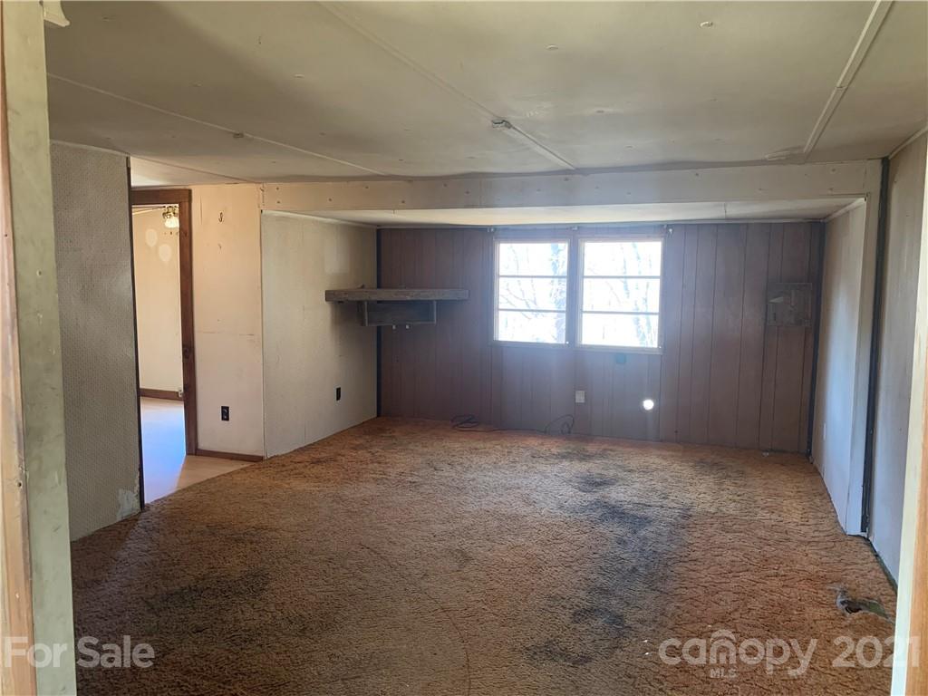 255 Sherrill Road Bryson City, NC 28713 - Photo 8 of 15 a view of an empty room and window