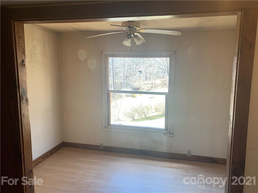 255 Sherrill Road Bryson City, NC 28713 - Photo 9 of 15 a view of an empty room and window