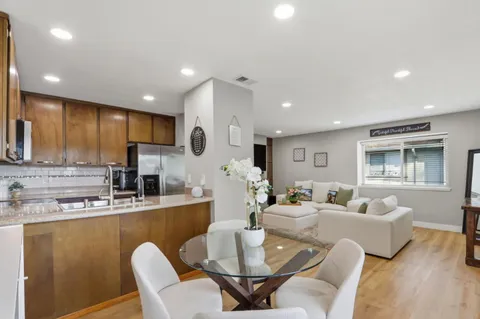 a view of a dining room with furniture