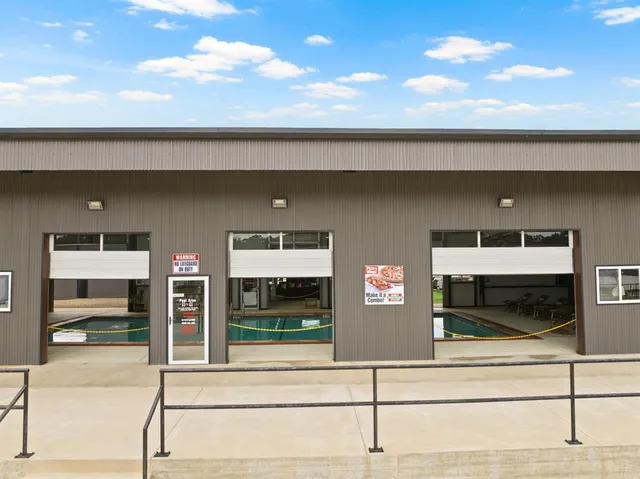 swimming view with swimming pool and mountain view