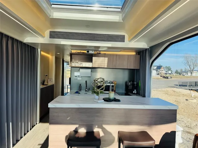 a room with furniture and a fireplace