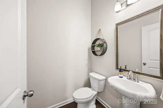 a bathroom with a toilet and a sink