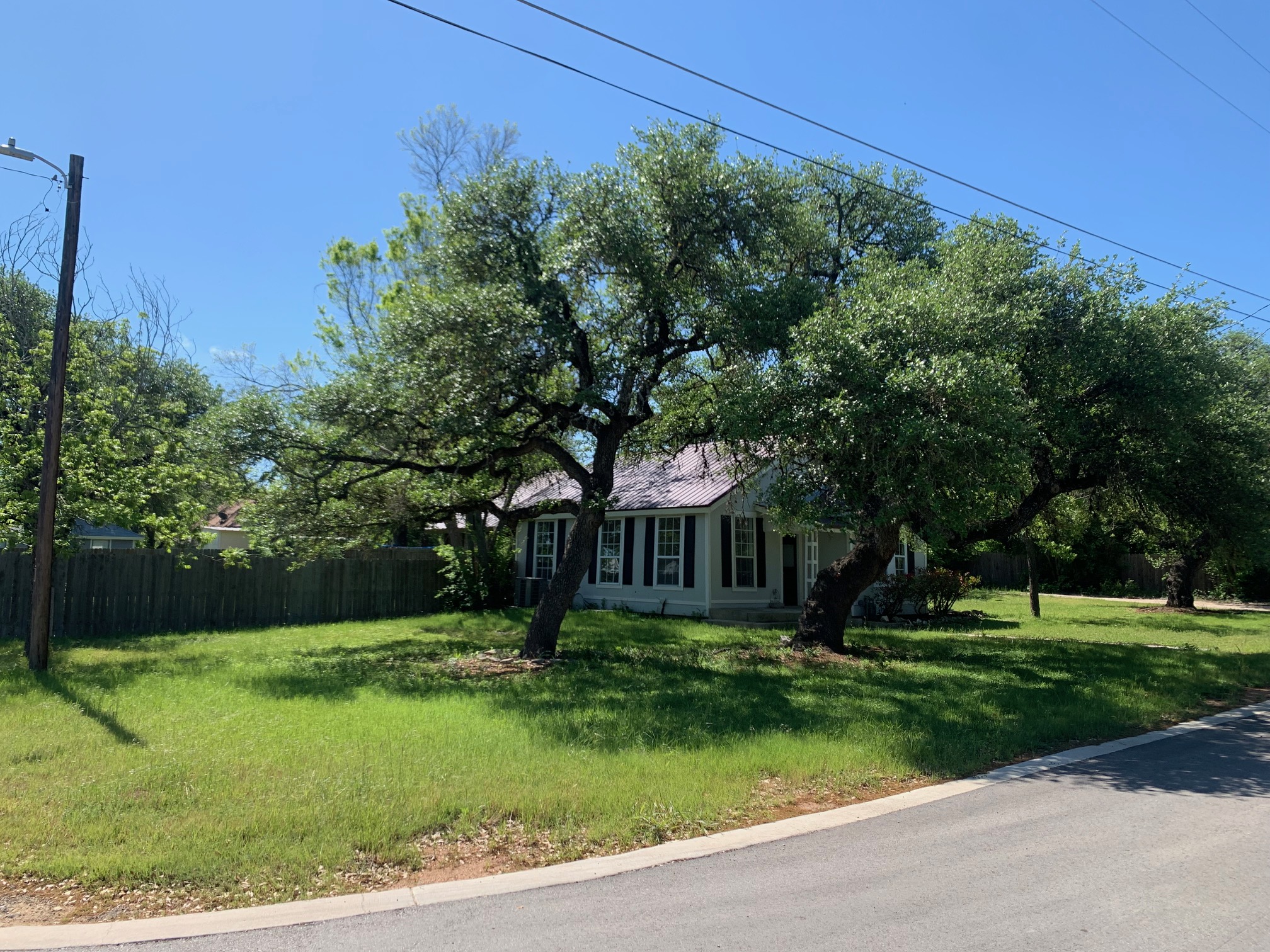 435 North Street Bertram, TX 78605 - Photo 4 of 14 a view of house with a yard