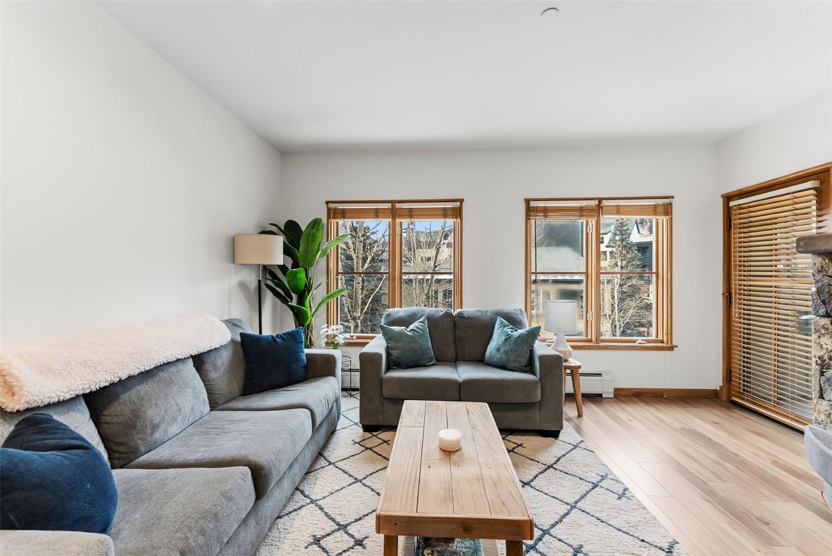 195 River Run Road, Unit 8015 Keystone, CO 80435 - Photo 8 of 35 a living room with furniture and a large window