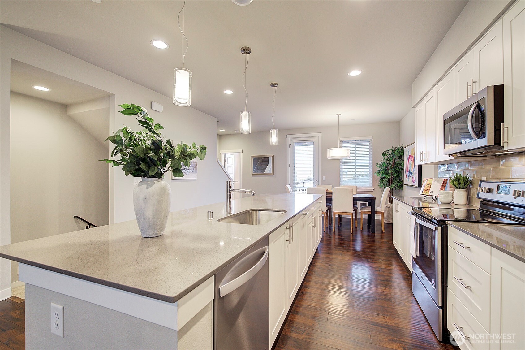 1325 Seattle Hill Road, Unit L2 Bothell, WA 98012 - Photo 14 of 36 a large kitchen with kitchen island lots of counter space a sink and appliances