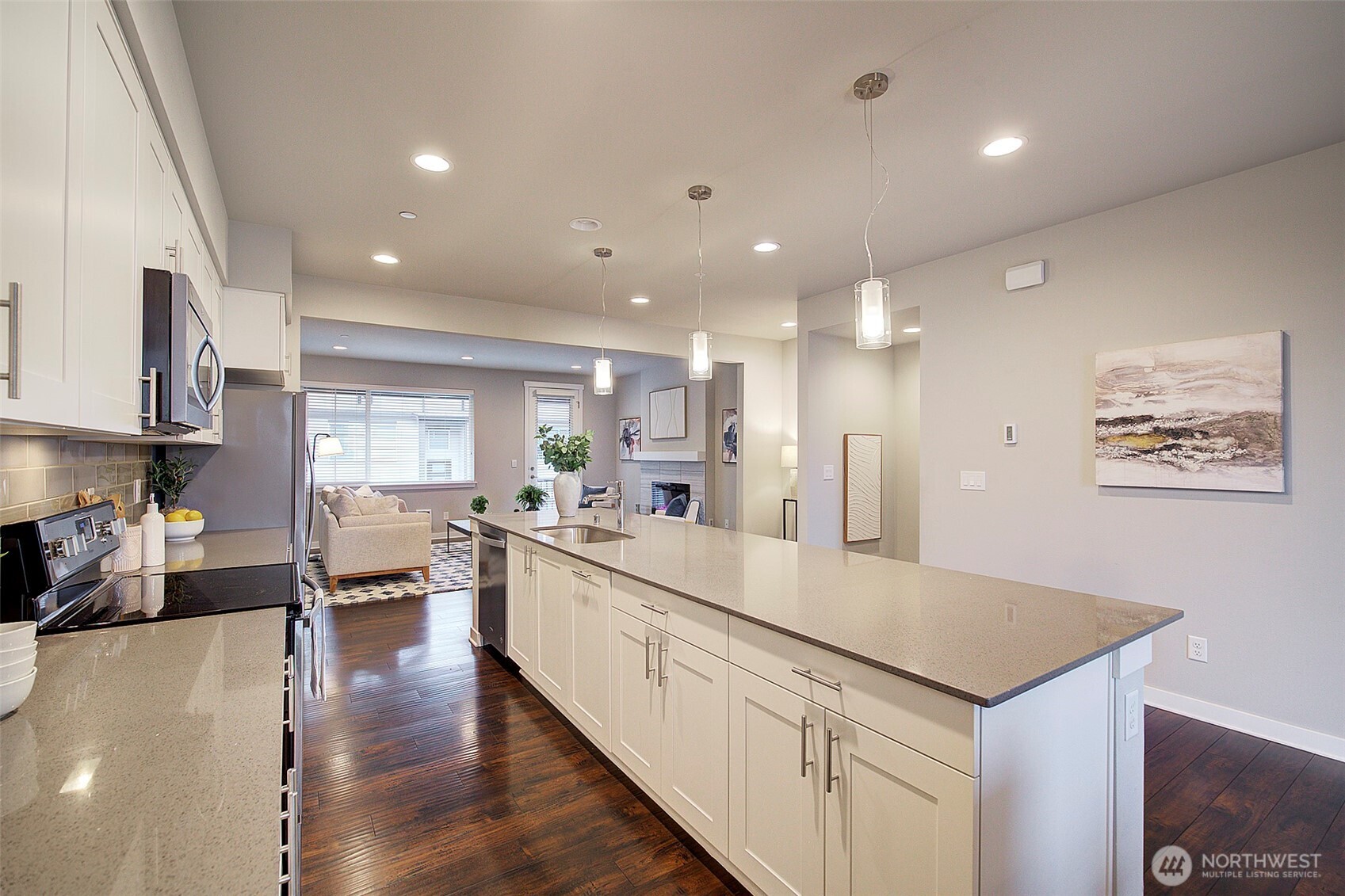 1325 Seattle Hill Road, Unit L2 Bothell, WA 98012 - Photo 15 of 36 a large kitchen with a large counter top appliances and cabinets