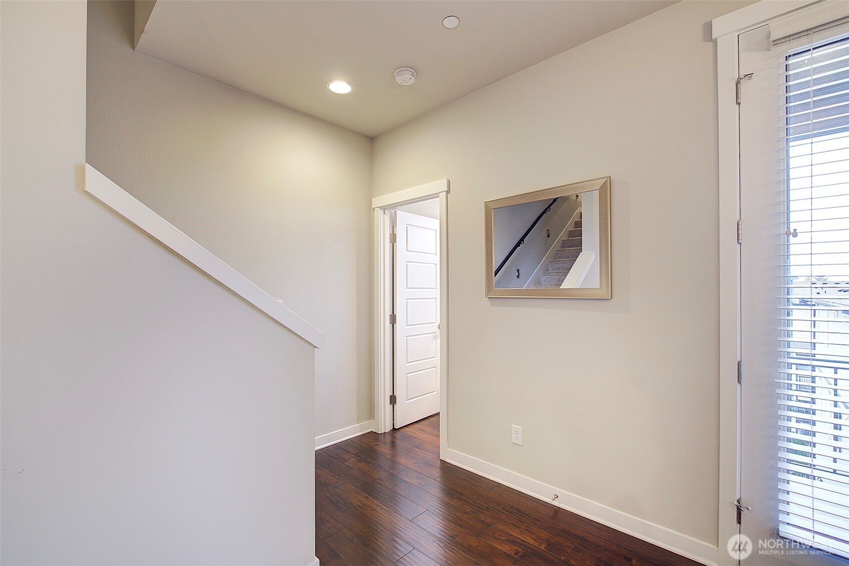 1325 Seattle Hill Road, Unit L2 Bothell, WA 98012 - Photo 20 of 36 an empty room with wooden floor and windows