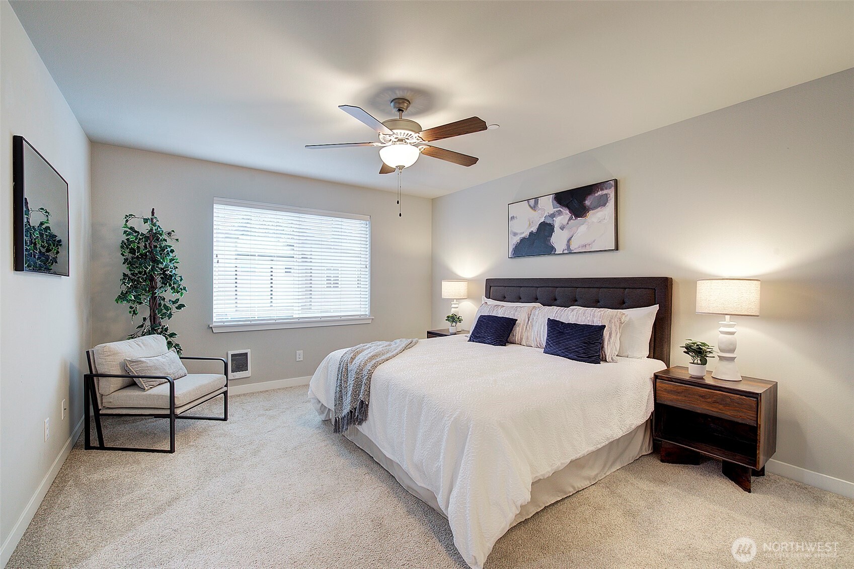 1325 Seattle Hill Road, Unit L2 Bothell, WA 98012 - Photo 22 of 36 a bedroom with a bed and a chandelier