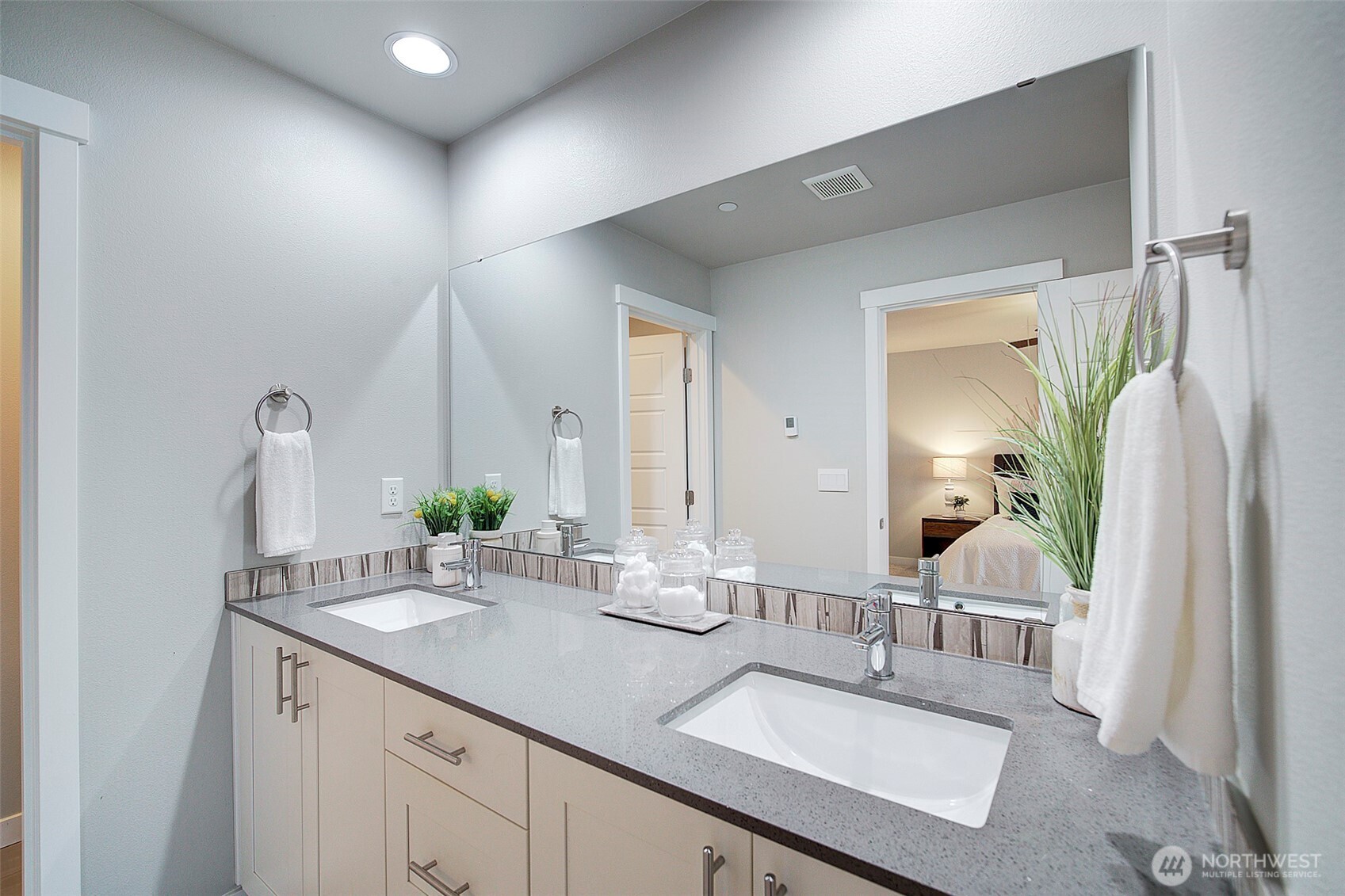1325 Seattle Hill Road, Unit L2 Bothell, WA 98012 - Photo 25 of 36 a bathroom with double vanity sinks and a mirror