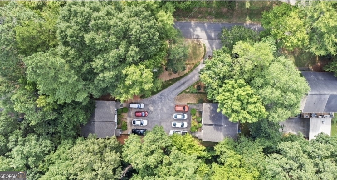 322 A & B And 3 Alfred Avenue Southeast, Unit 322 Rome, GA 30161 - Photo 2 of 9 an aerial view of a house by greenery space and trees all around