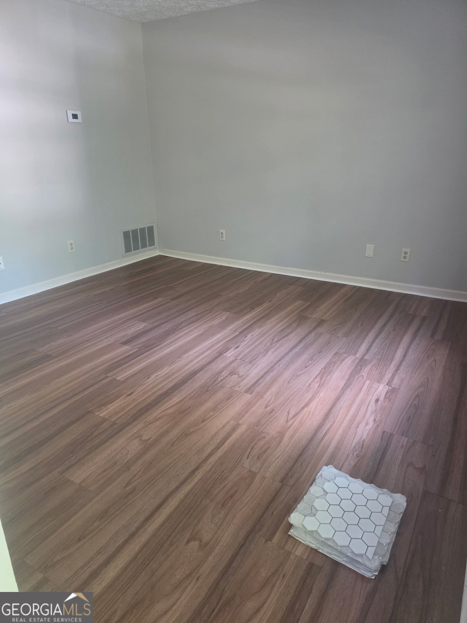 322 A & B And 3 Alfred Avenue Southeast, Unit 322 Rome, GA 30161 - Photo 8 of 9 wooden floor in a empty room