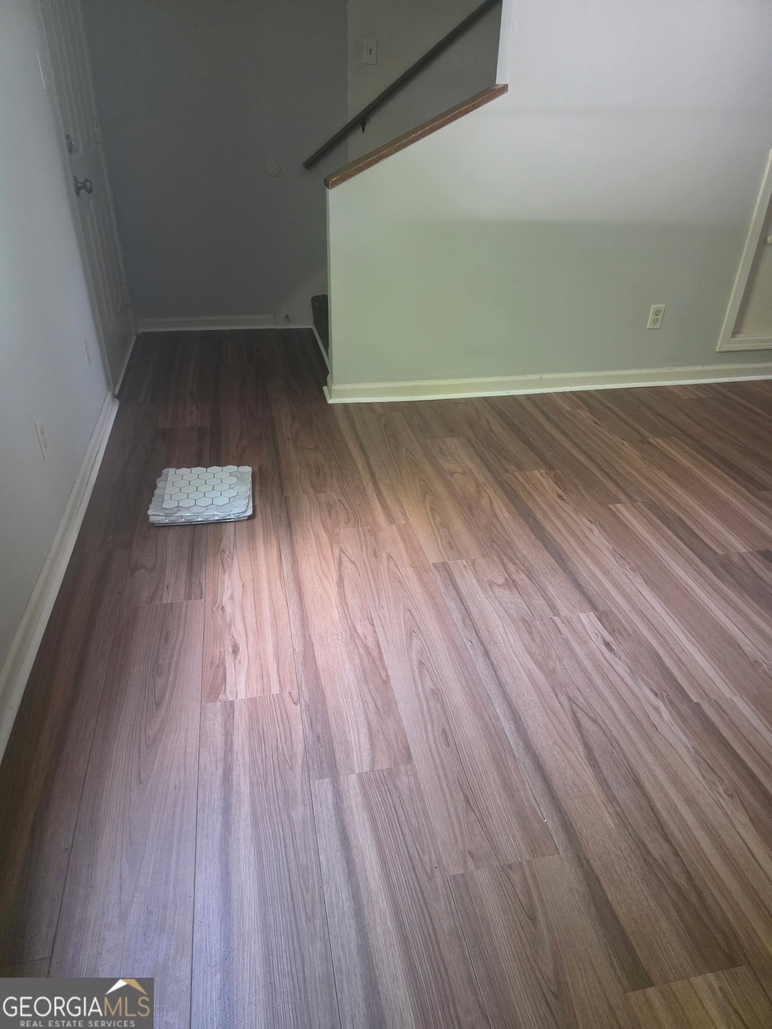 322 A & B And 3 Alfred Avenue Southeast, Unit 322 Rome, GA 30161 - Photo 9 of 9 an empty room with wooden floor