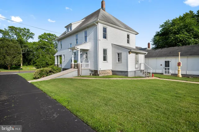 a view of a house with porch and wooden floor