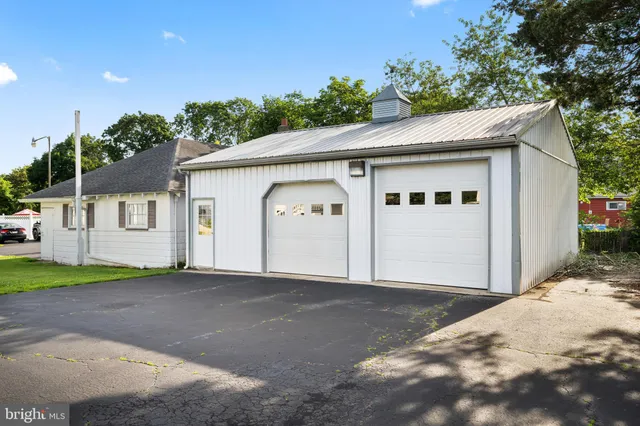 a front view of a house with a garage