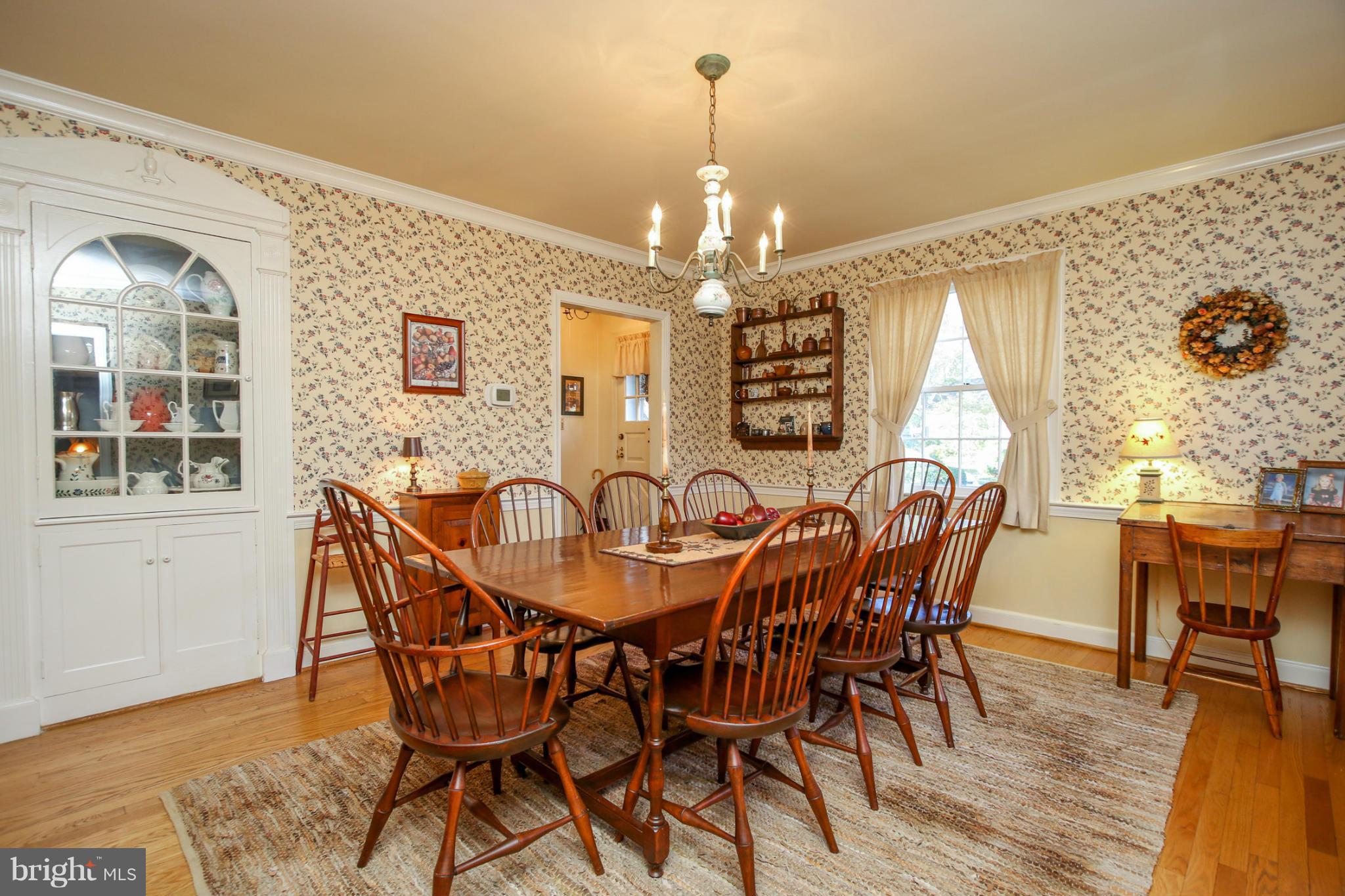 503 Worcester Road Towson, MD 21286 - Photo 6 of 18 a view of a dining room with furniture and wooden floor