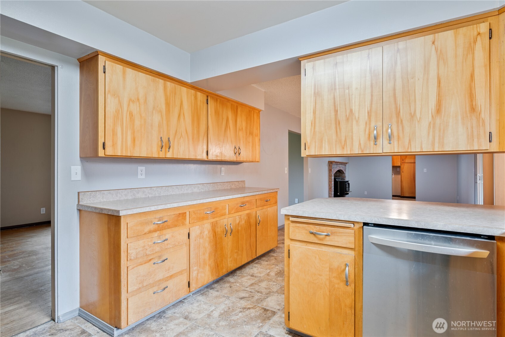 2128 44th Avenue Longview, WA 98632 - Photo 14 of 35 a kitchen with stainless steel appliances granite countertop a sink stove and cabinets
