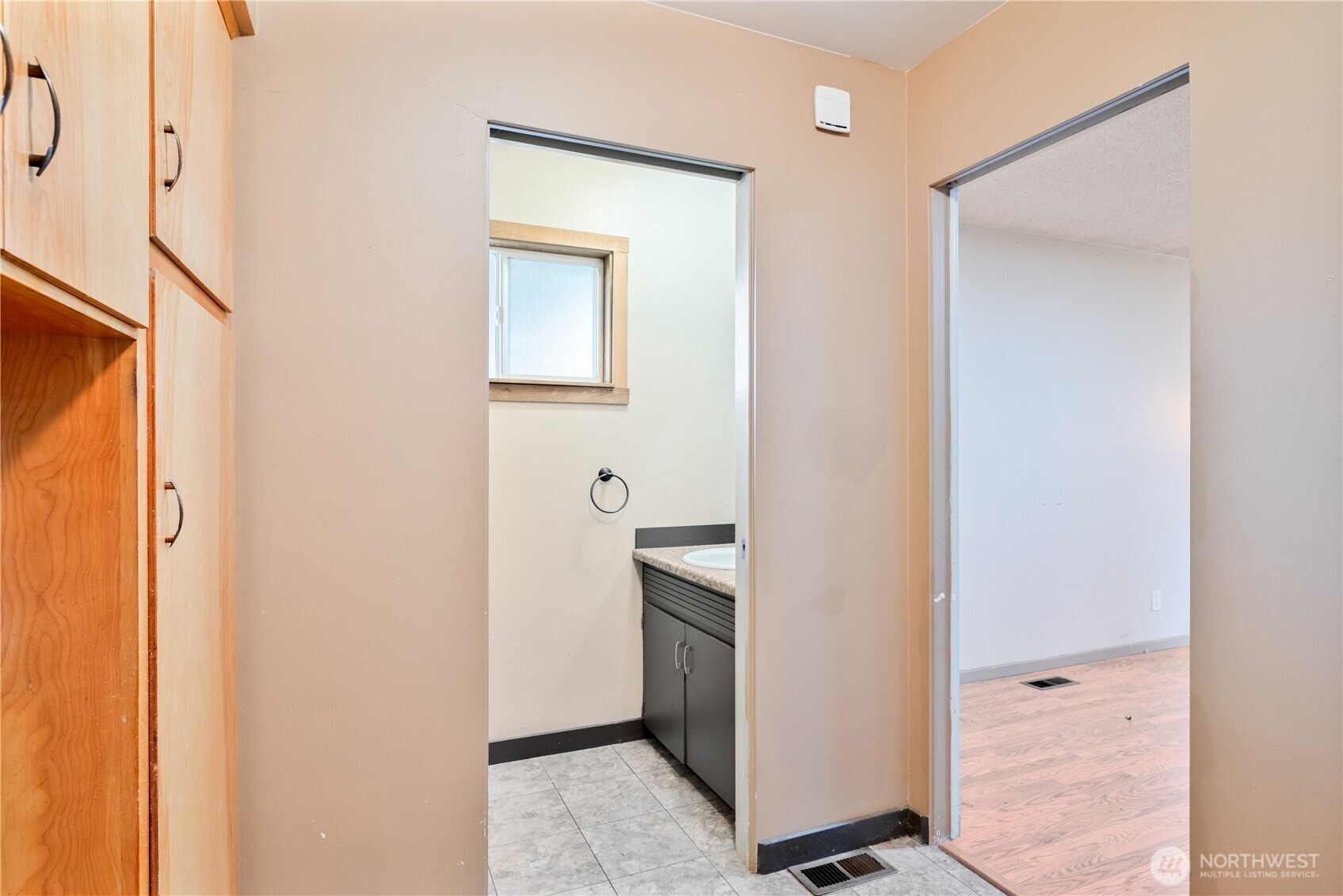 2128 44th Avenue Longview, WA 98632 - Photo 16 of 35 a bathroom with a double vanity sink and a mirror