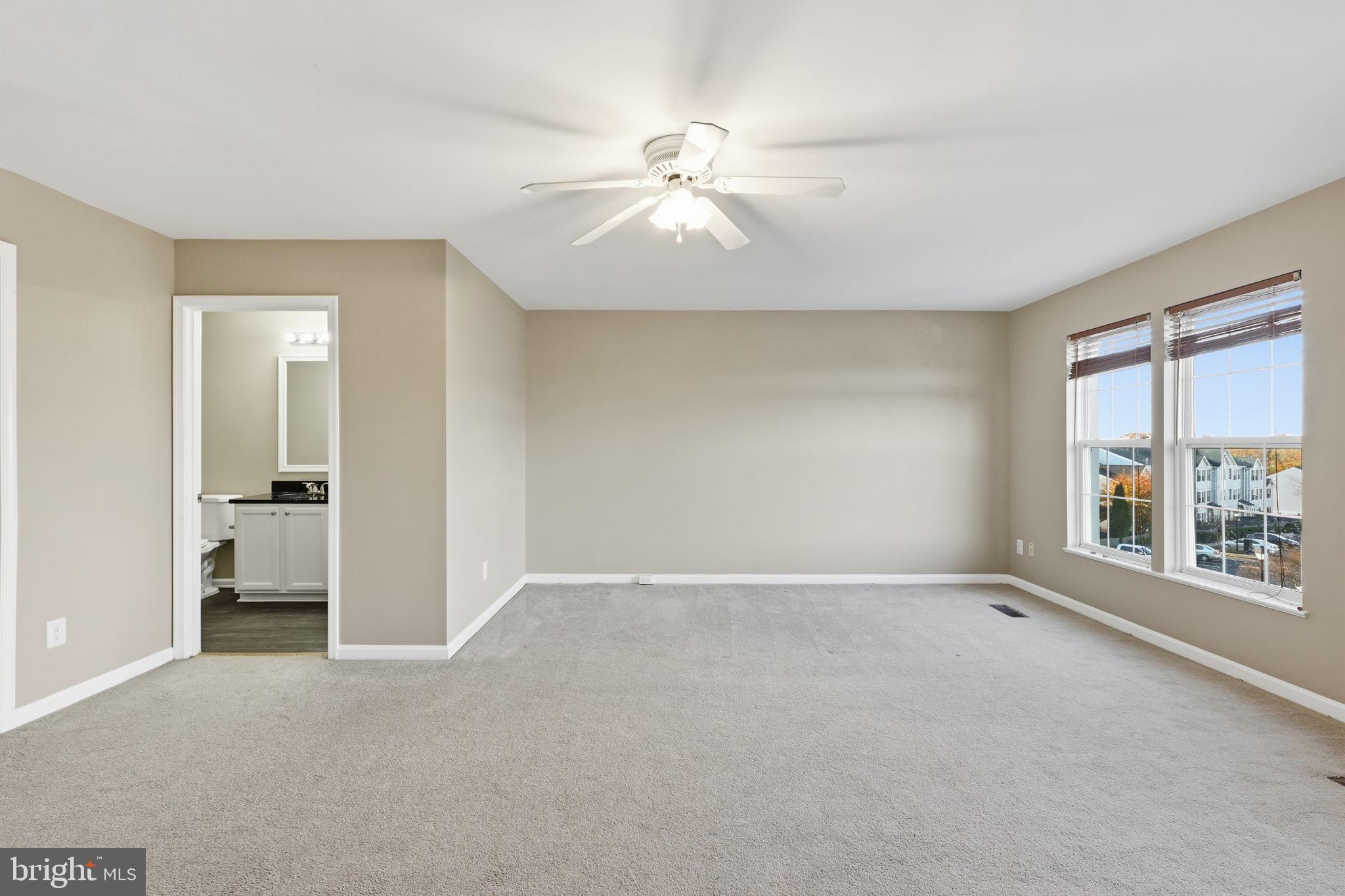 9304 Witch Hazel Way Manassas, VA 20110 - Photo 12 of 45 a view of an empty room with a window