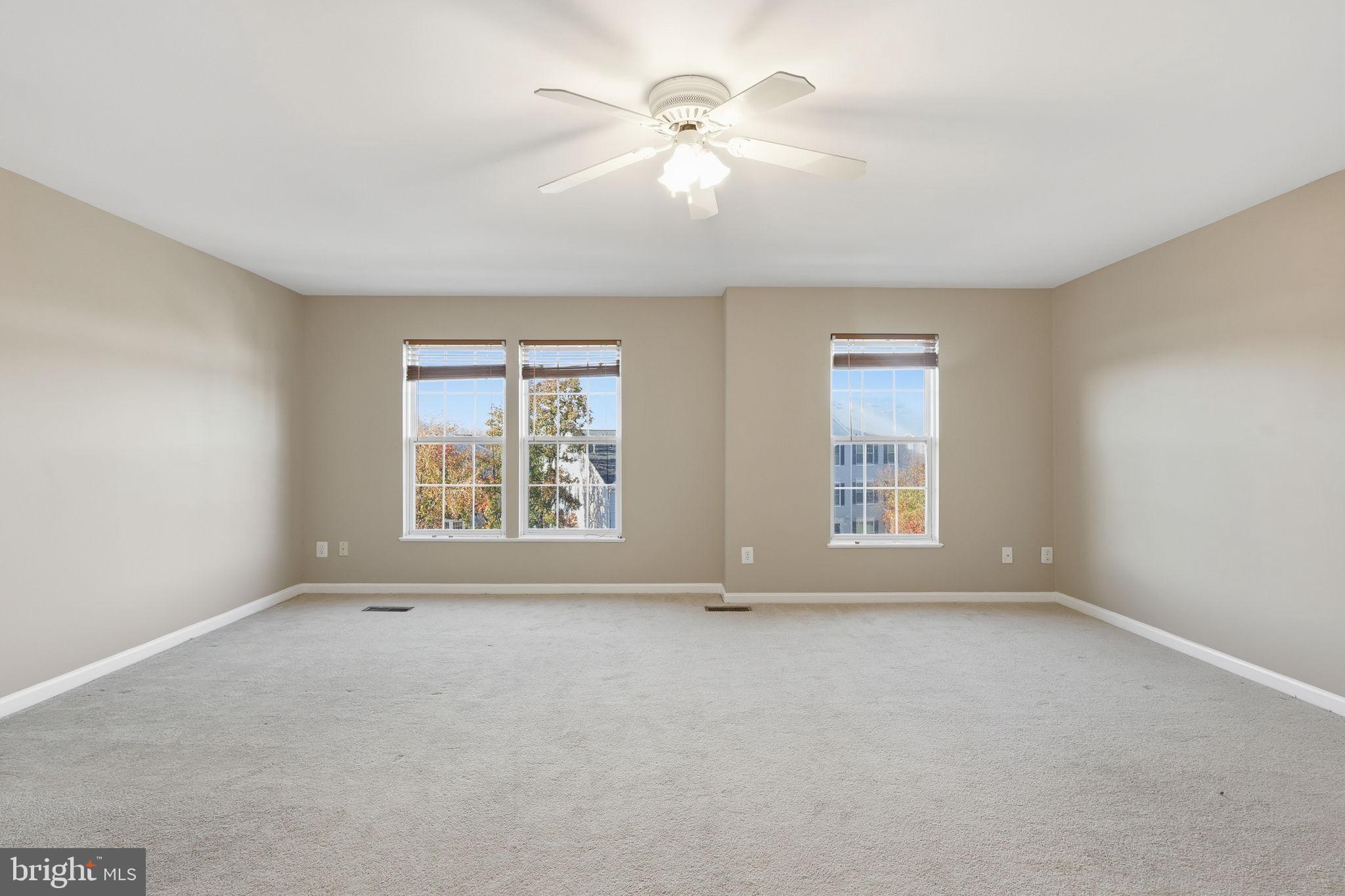 9304 Witch Hazel Way Manassas, VA 20110 - Photo 14 of 45 a view of an empty room with a window