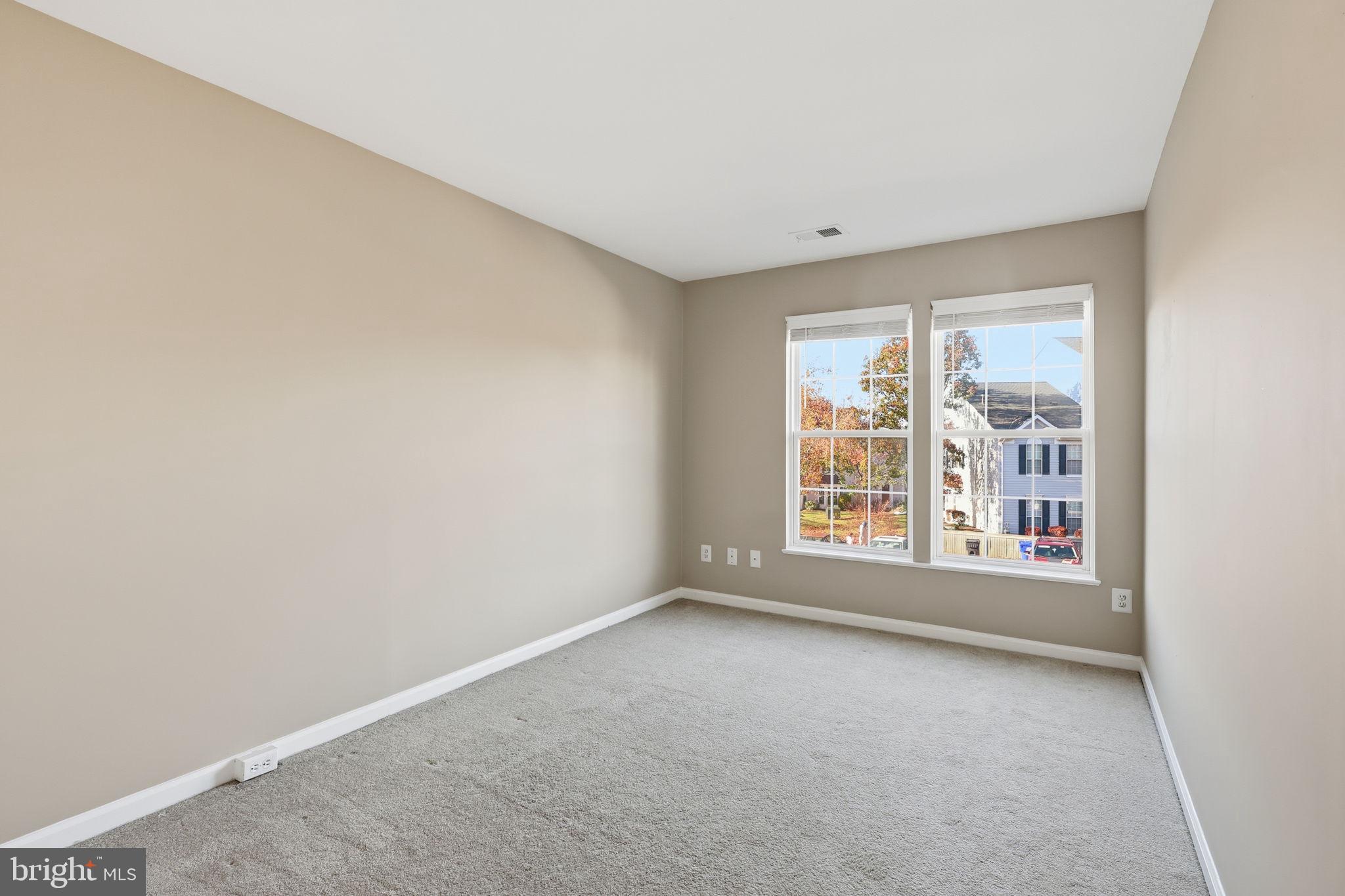 9304 Witch Hazel Way Manassas, VA 20110 - Photo 27 of 45 a view of an empty room with a window