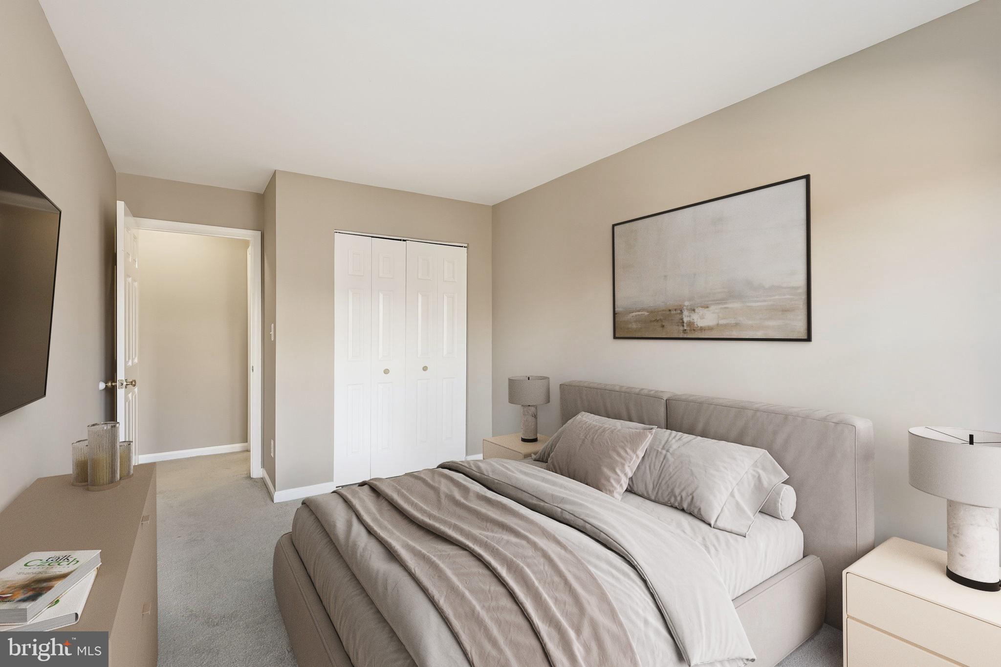 9304 Witch Hazel Way Manassas, VA 20110 - Photo 30 of 45 a bedroom with a bed and a painting on the wall