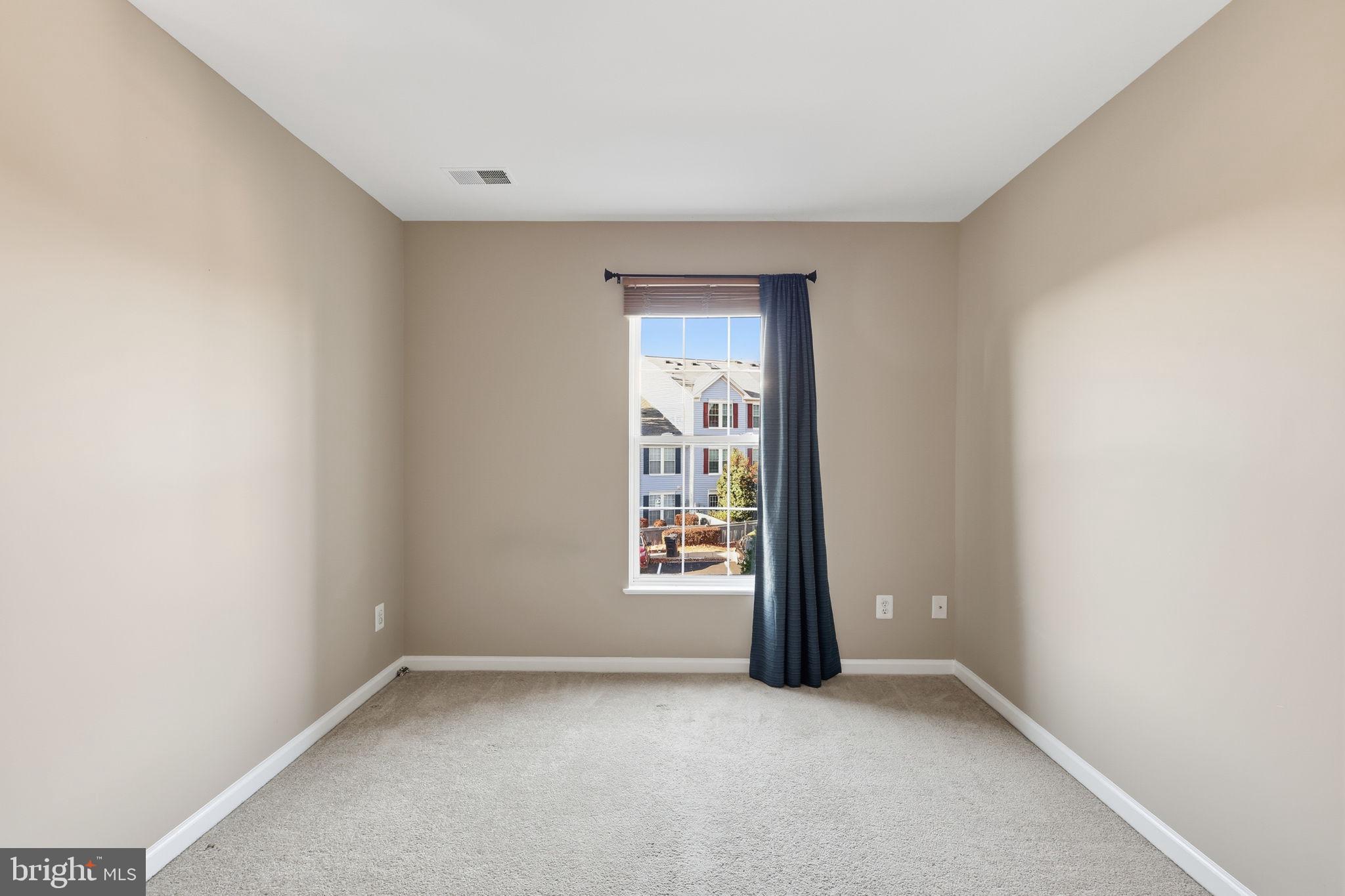 9304 Witch Hazel Way Manassas, VA 20110 - Photo 33 of 45 a view of an empty room and window