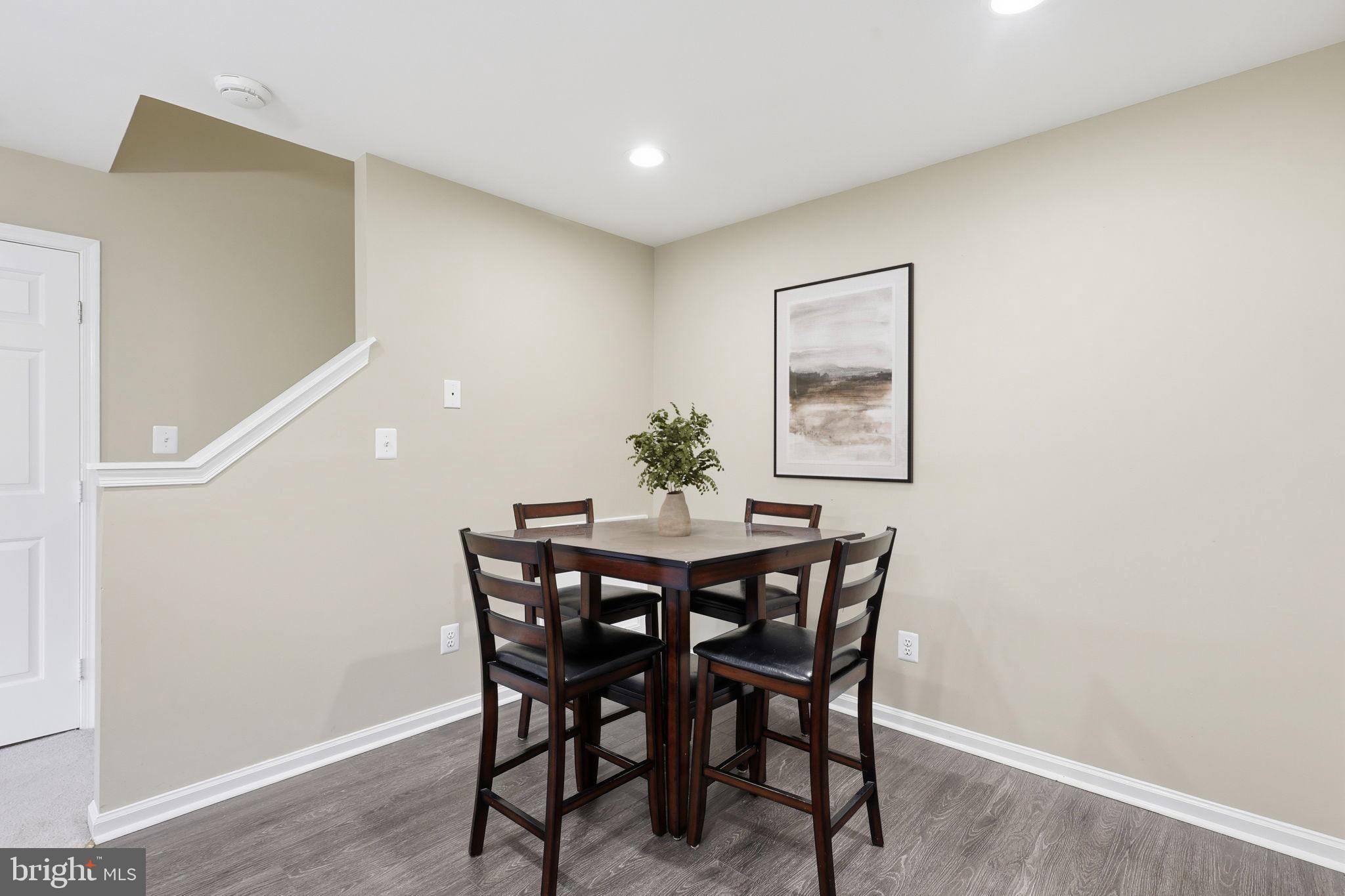 9304 Witch Hazel Way Manassas, VA 20110 - Photo 8 of 45 a dining room with furniture and window
