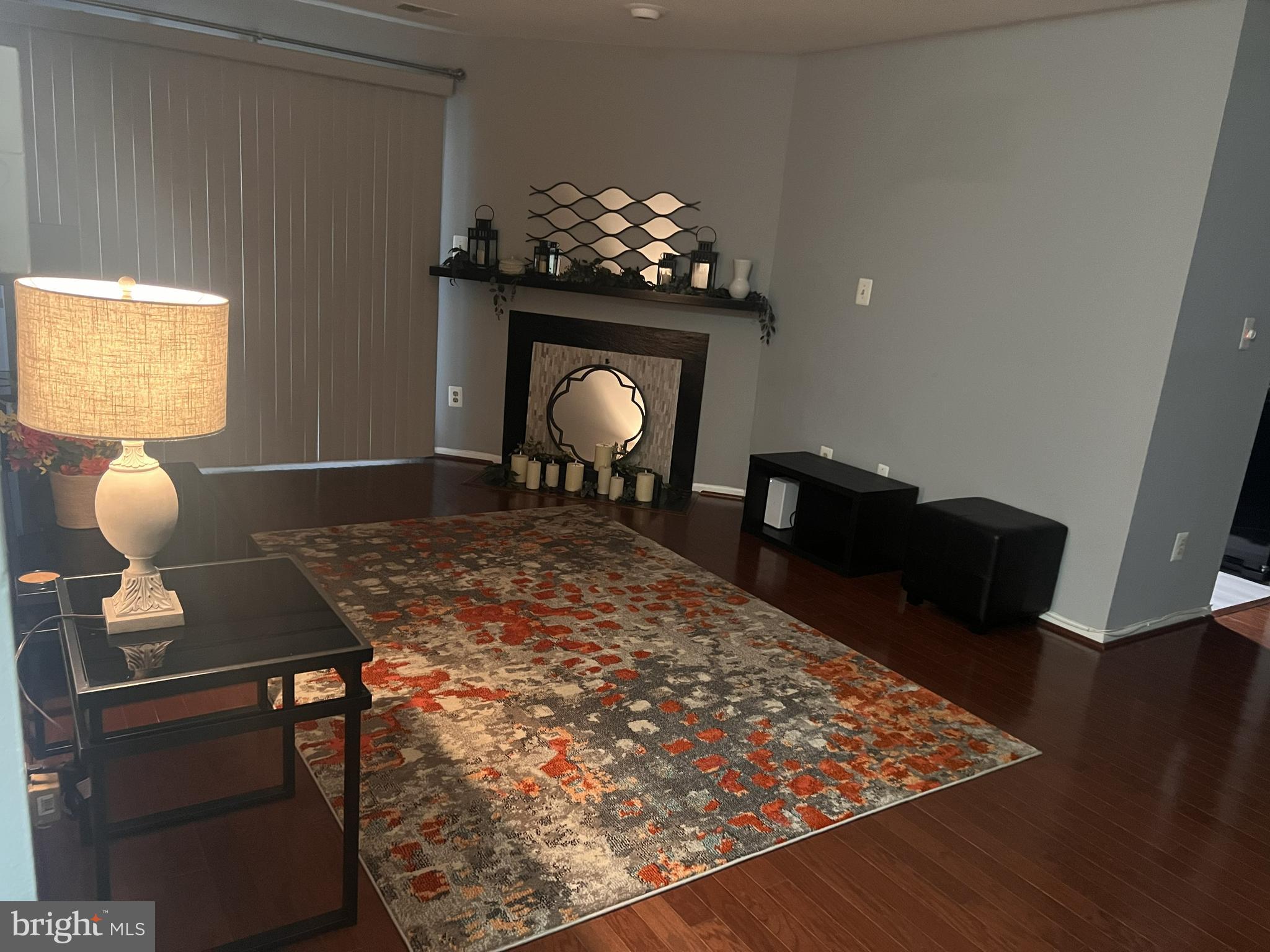 3142 Quartet Lane, Unit 255 Silver Spring, MD 20904 - Photo 3 of 14 a bedroom with a bed and a chandelier