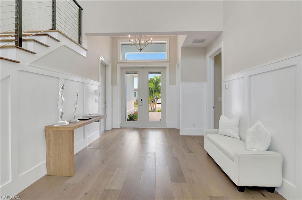 1308 Ridge Street Naples, FL 34103 - Photo 12 of 48 a living room with furniture and wooden floor