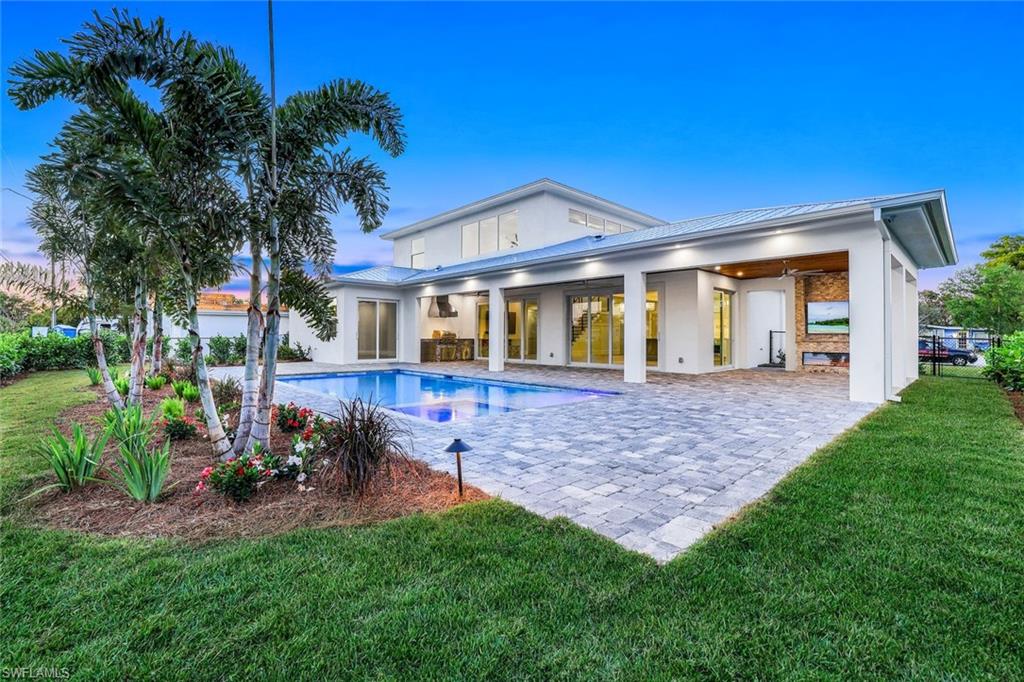 1308 Ridge Street Naples, FL 34103 - Photo 2 of 48 Private Fenced-In Backyard Oasis