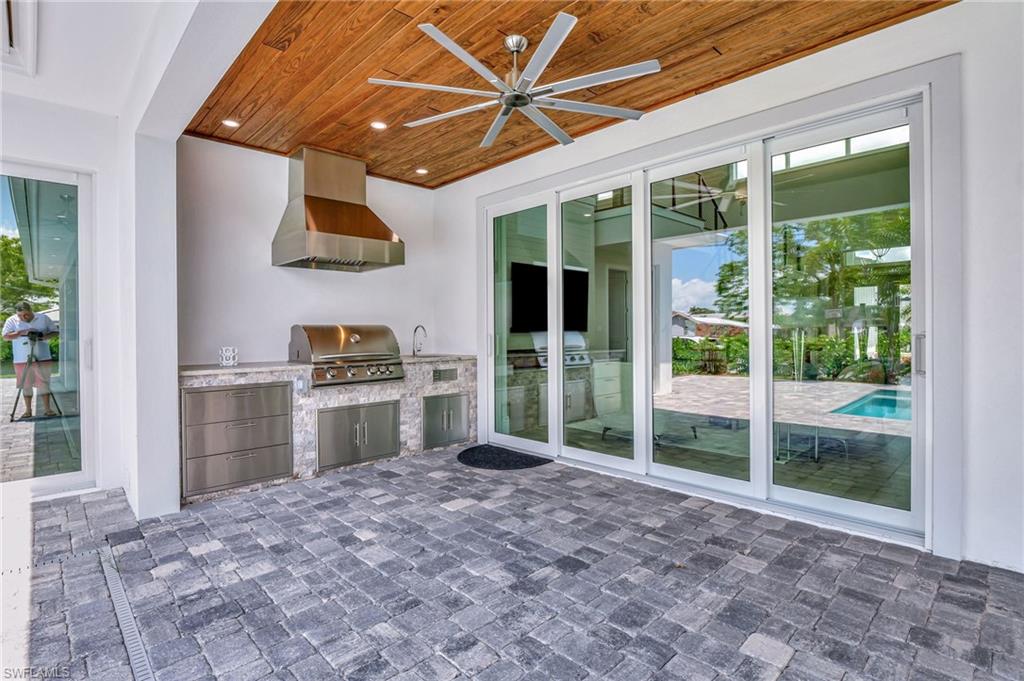 1308 Ridge Street Naples, FL 34103 - Photo 38 of 48 Summer Kitchen Making Pool-Side Cook-Outs and Alfresco Dinning a Breeze!