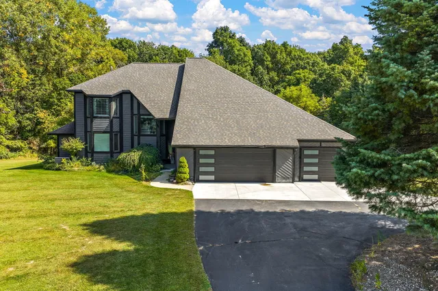$825,000 | 9820 Snow Pointe Drive Southeast, Alto, MI 49302