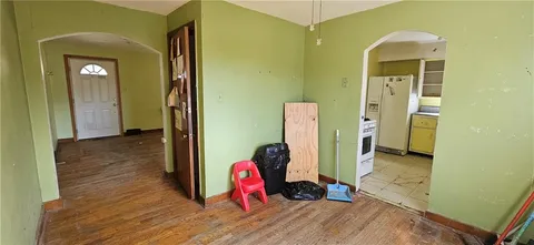 a utility room with cabinets dryer and washer