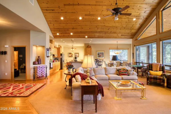 a bedroom with a bed and a mirror