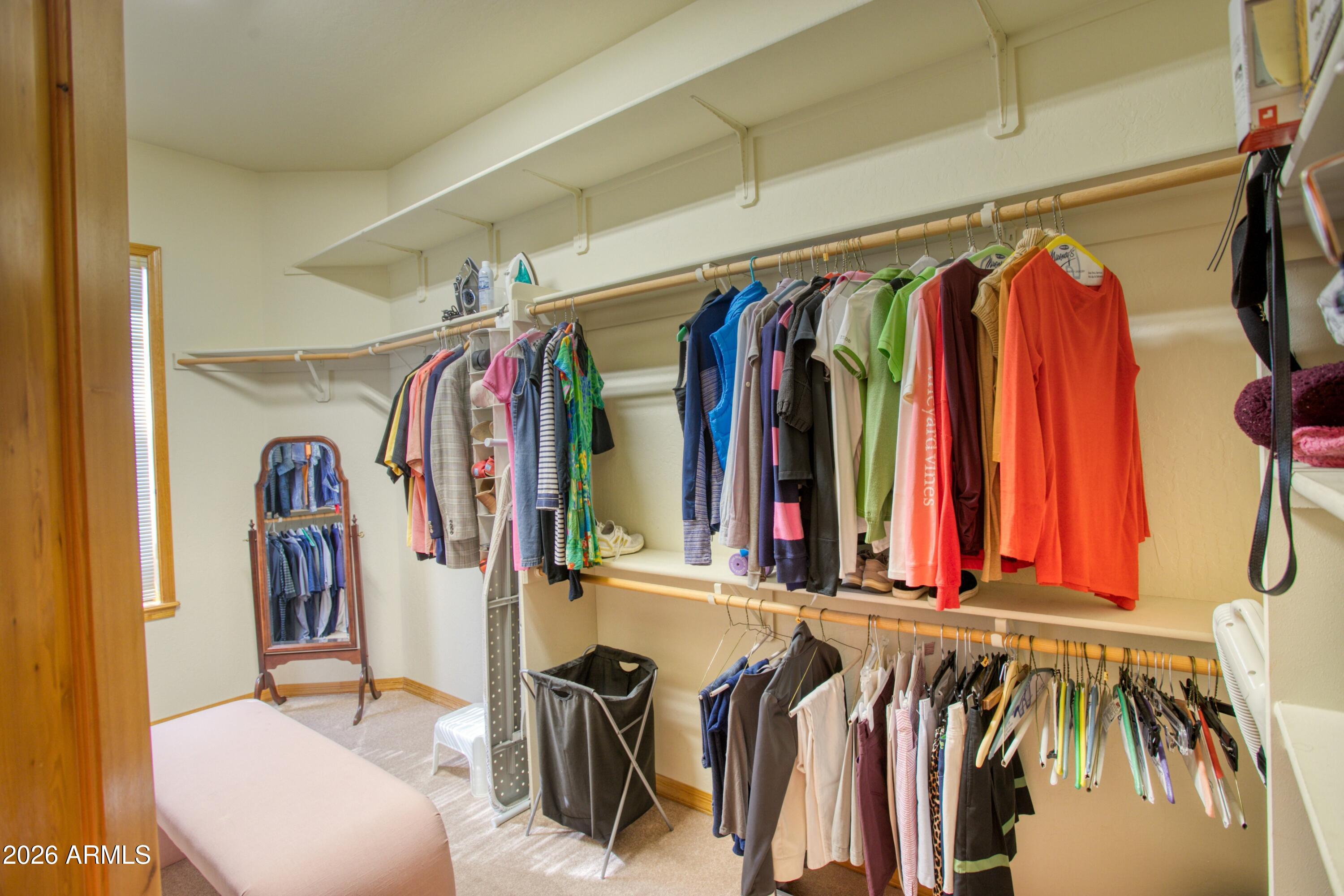 3990 Sugar Pine Loop Show Low, AZ 85901 - Photo 22 of 62 a view of walk in closet with clothes and shoes