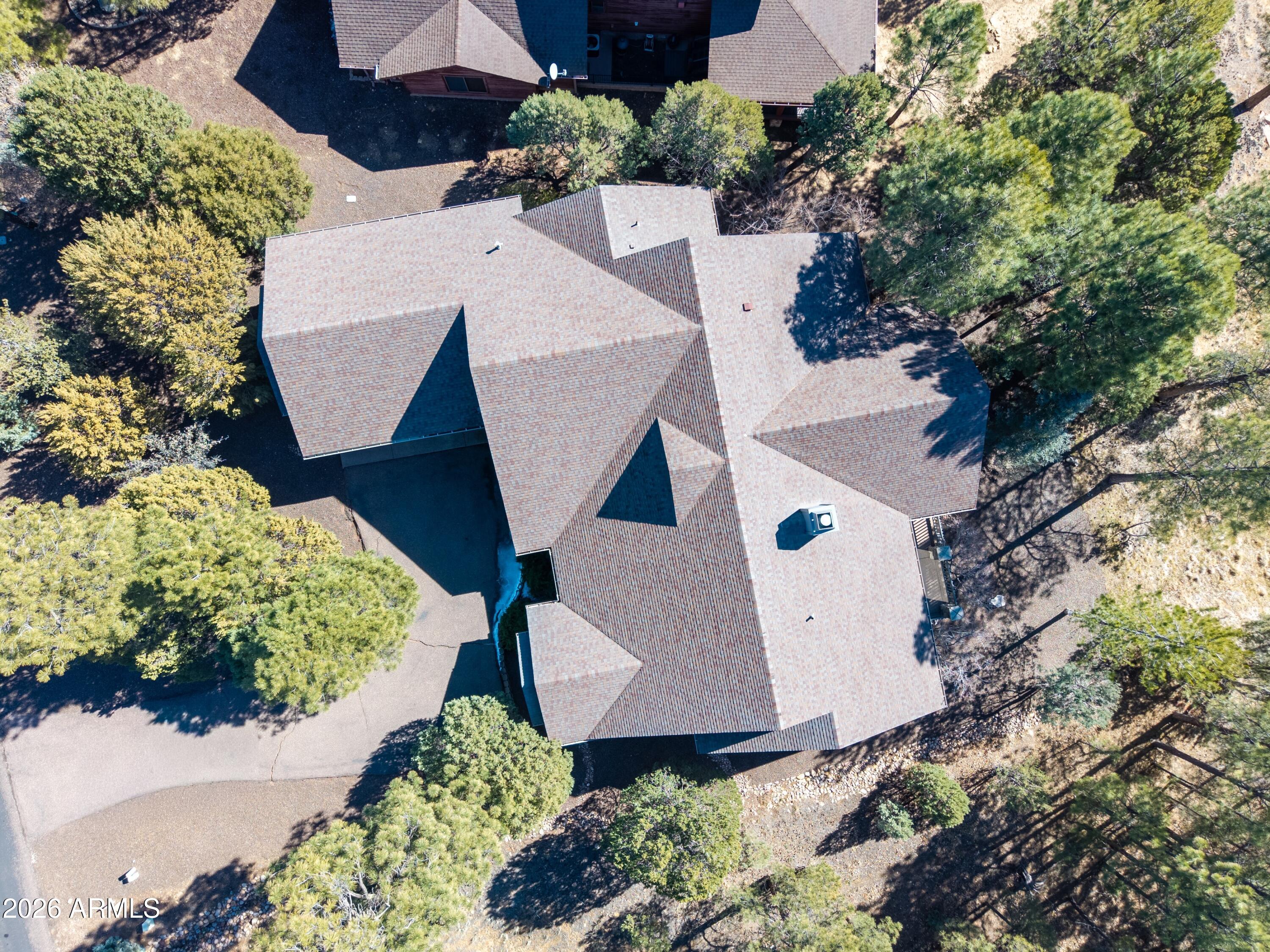 3990 Sugar Pine Loop Show Low, AZ 85901 - Photo 34 of 62 an aerial view of a house with a yard and garden