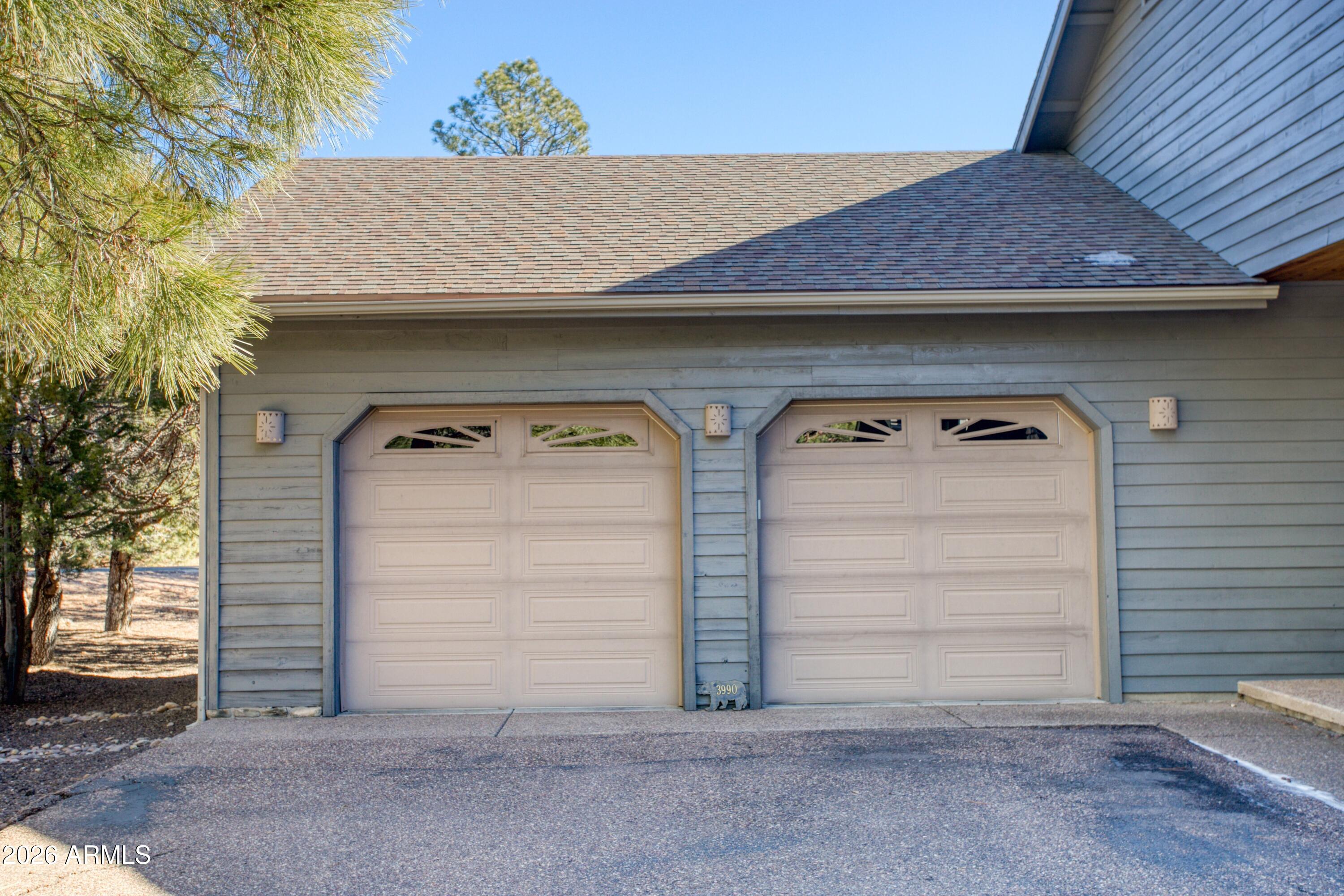 3990 Sugar Pine Loop Show Low, AZ 85901 - Photo 37 of 62 a view of garage with a large window