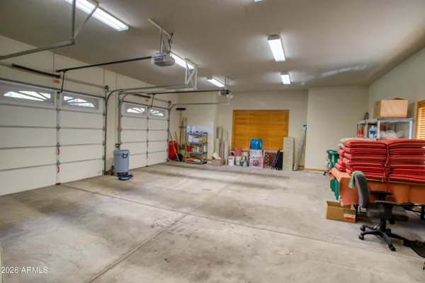 a front view of house with yard entertaining space and seating area