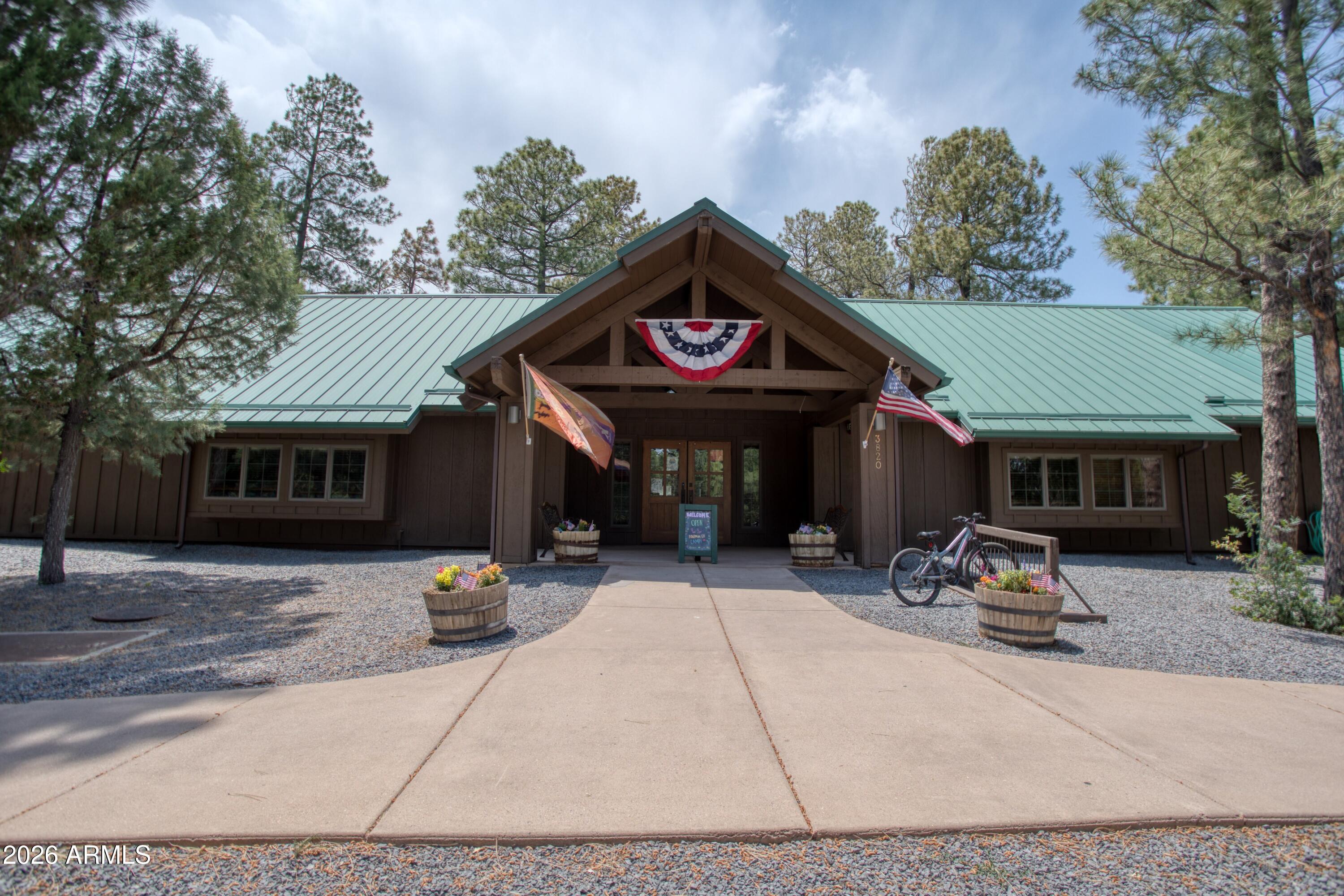 3990 Sugar Pine Loop Show Low, AZ 85901 - Photo 41 of 62 a view of a car park in front of house