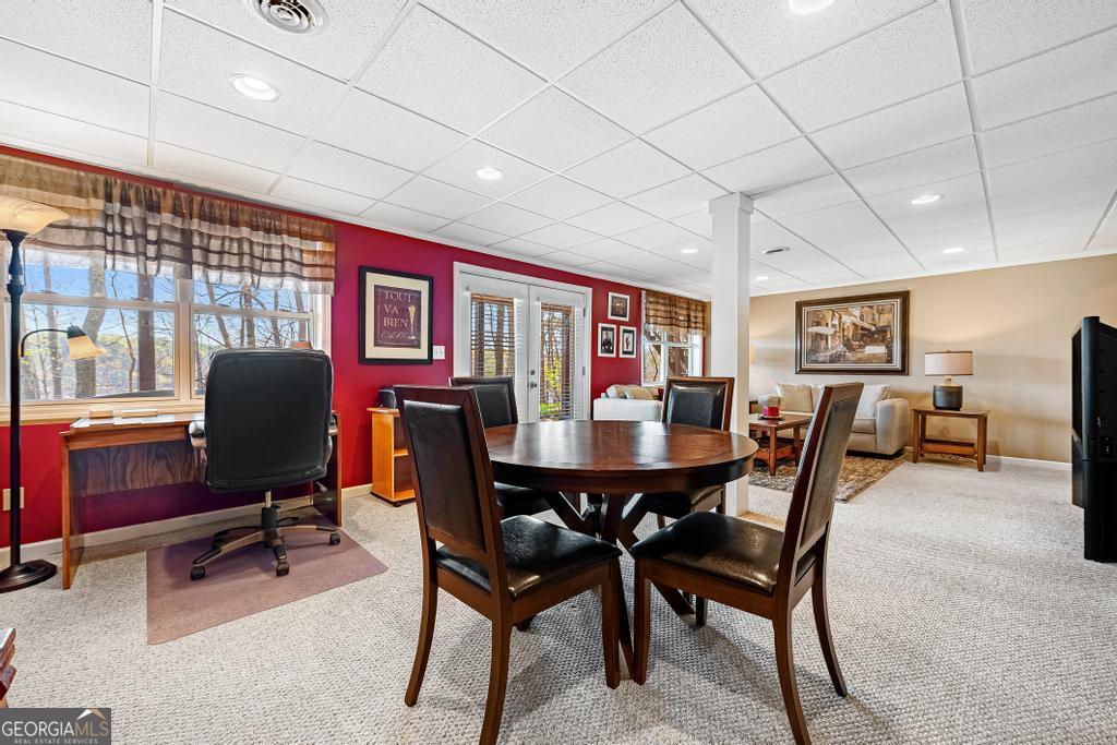 997 Rue Fluer De Lis Lavonia, GA 30553 - Photo 21 of 38 a view of a dining room with furniture