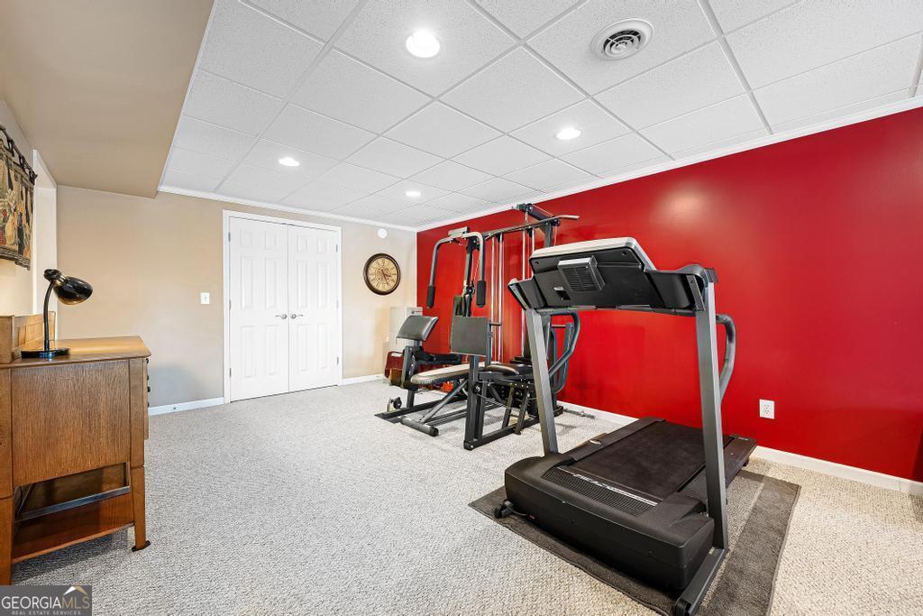 997 Rue Fluer De Lis Lavonia, GA 30553 - Photo 22 of 38 a room with gym equipment