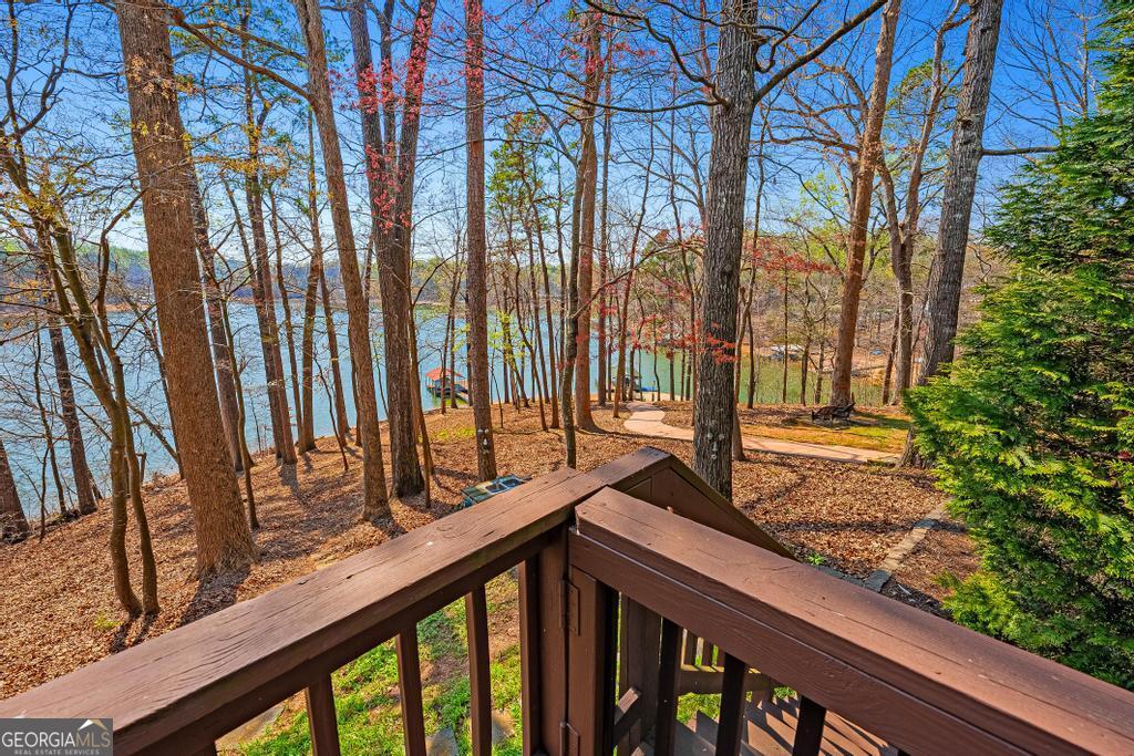 997 Rue Fluer De Lis Lavonia, GA 30553 - Photo 28 of 38 a view of a wooden fence and trees