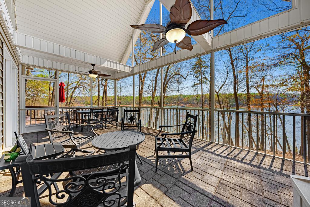 997 Rue Fluer De Lis Lavonia, GA 30553 - Photo 3 of 38 a view of a chairs and table in the balcony