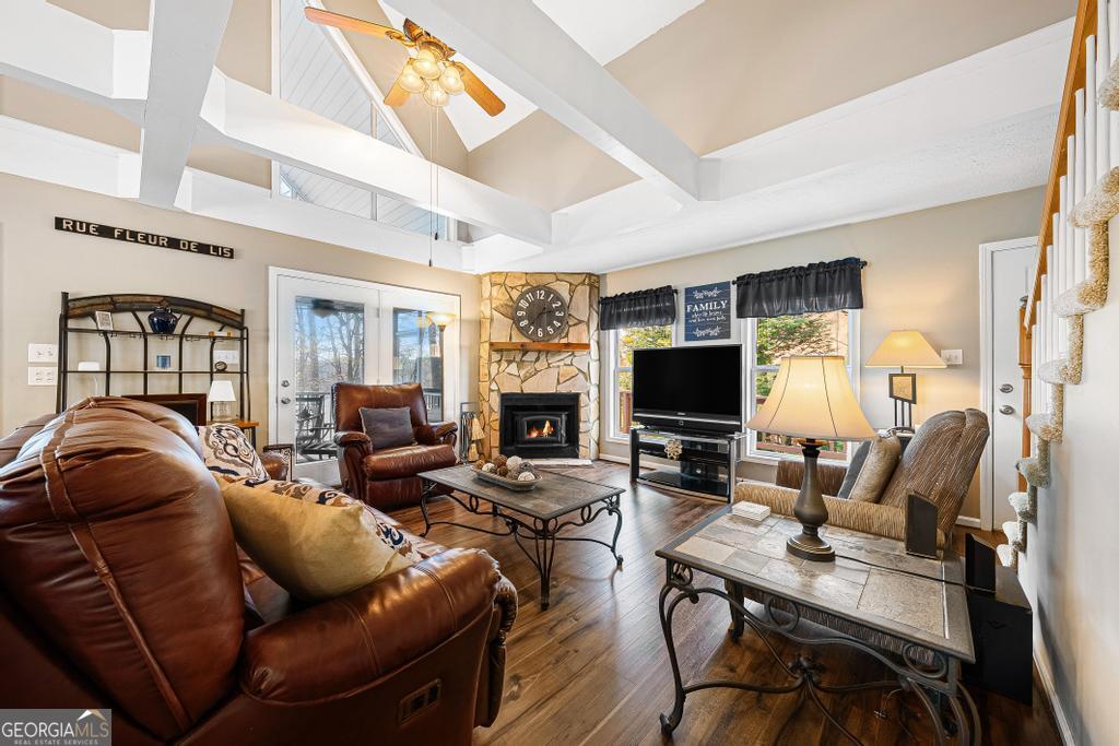 997 Rue Fluer De Lis Lavonia, GA 30553 - Photo 7 of 38 a living room with furniture and a flat screen tv