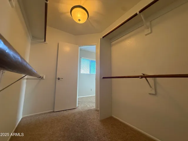 a view of a room with racks on the wall